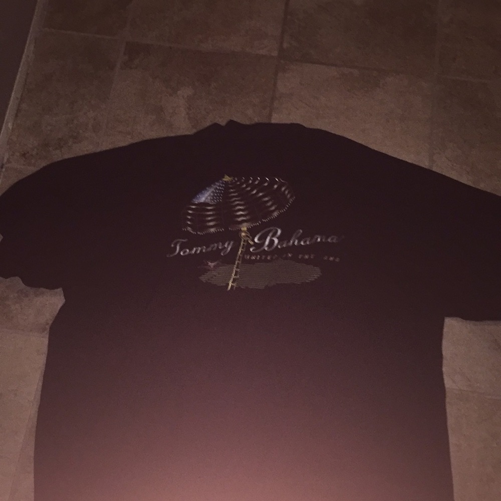 Black button down shirt with design on back